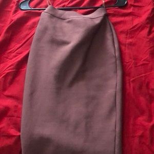 Brownish/pinkish a little above knees length skirt